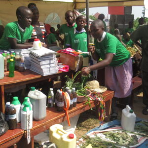Youth learners explaining how to make natural fertilizers from indigenous plants